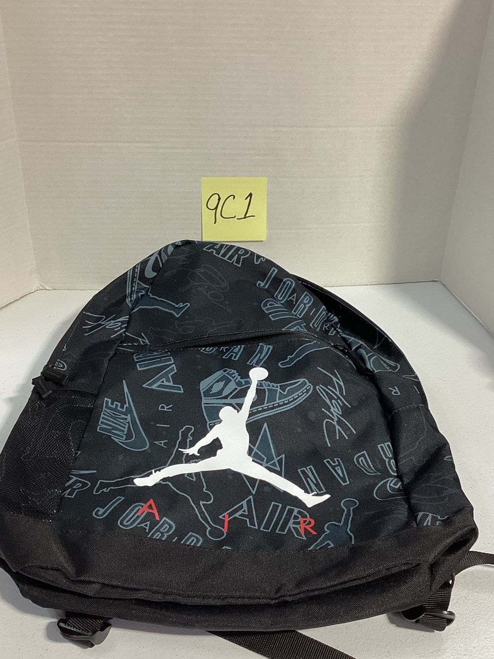 Jordan Black Backpack with White Jumpman and Red Accents
